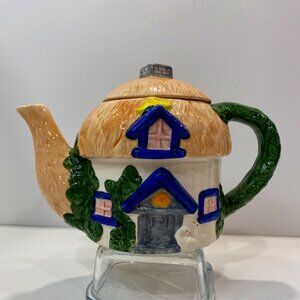 Vintage Ceramic Cottage Tea Pot Hand Painted. (6" H. x. 9" L.  x. 5" W)